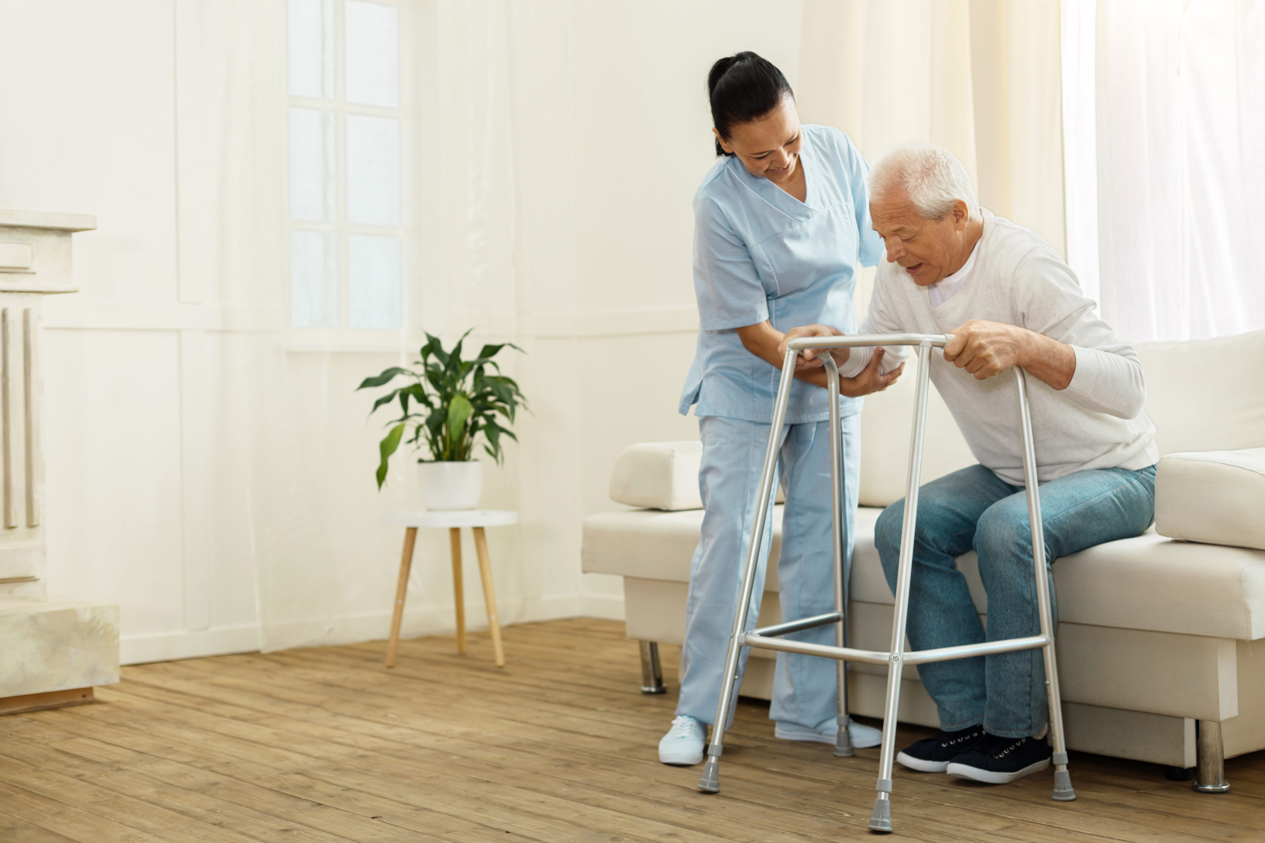 Delighted,Positive,Caregiver,Helping,Her,Patient VNC Agency Caregiver Placement